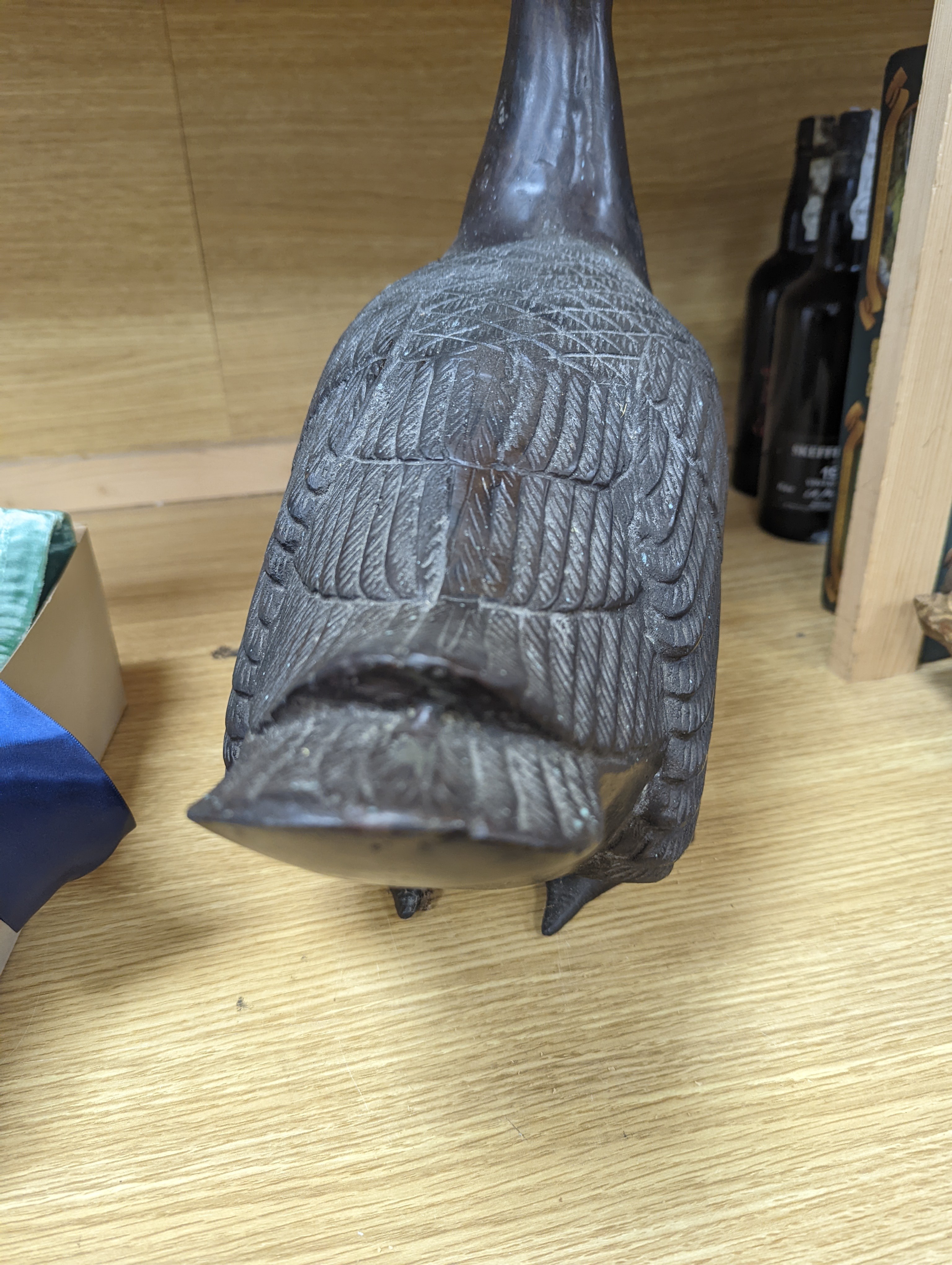 A pair of modern Chinese bronze models of geese, largest 48cm